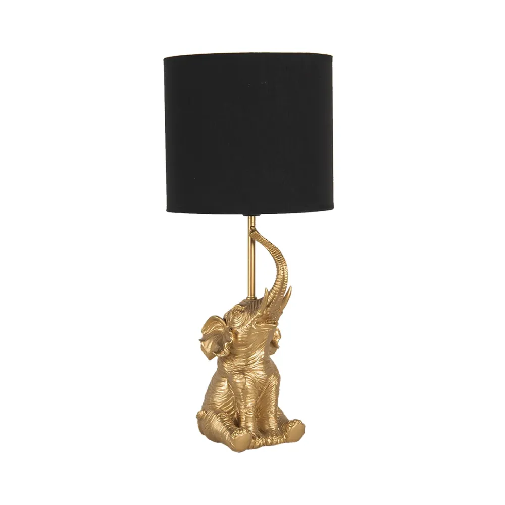 Candeeiro de mesa em forma de elefante dourado com cúpula preta.