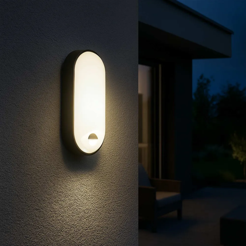 Plafon LED exterior ovalado com sensor PIR - 15W - CCT - IP65
